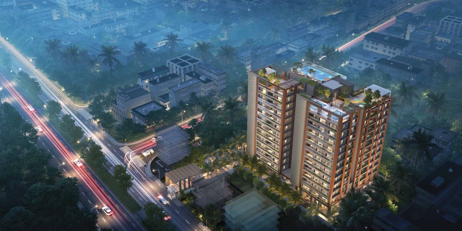 Signum Niva luxury 4 BHK residential tower illuminated at night on Diamond Harbour Road, Alipore, South Kolkata