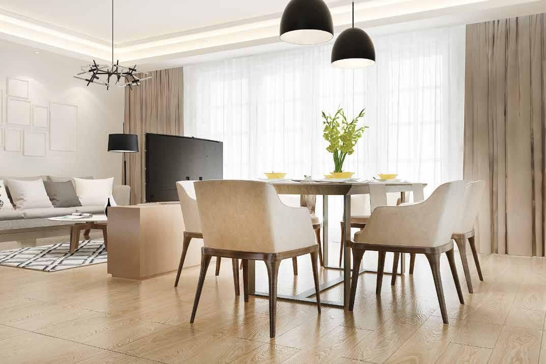Naturally lit dining room interior in a 4 BHK residence at Signum Niva, Diamond Harbour Road