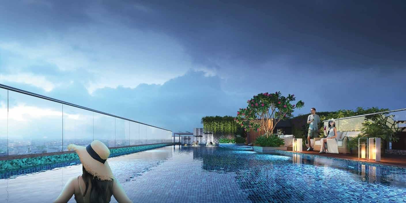 Signum Niva rooftop infinity pool running into the South Kolkata skyline